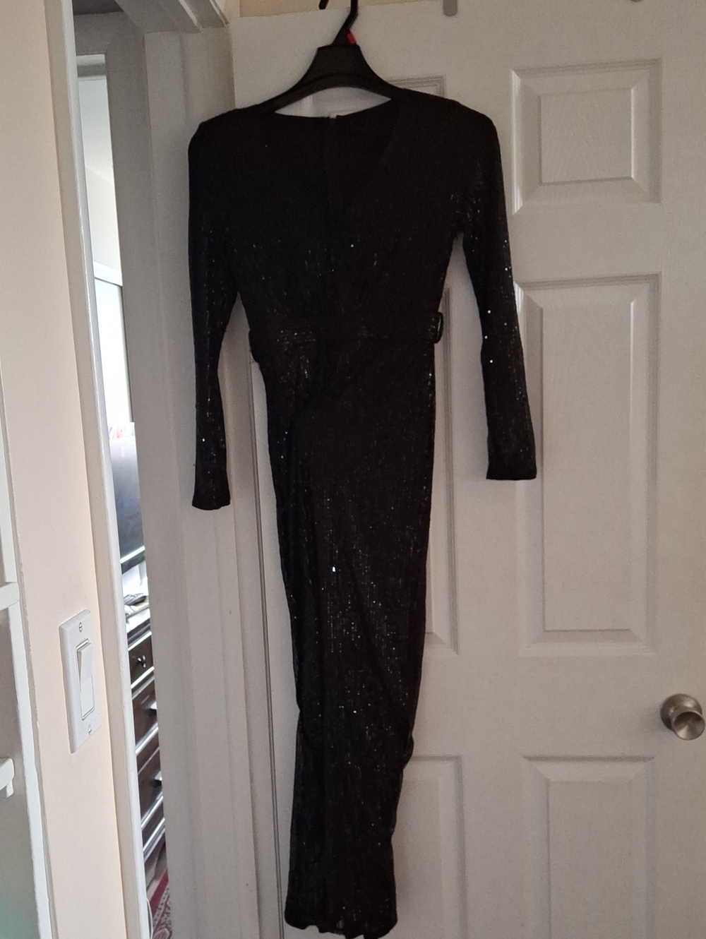 Ladies Elegant black sequin evening Romper with long sleeves. Designed to flatt